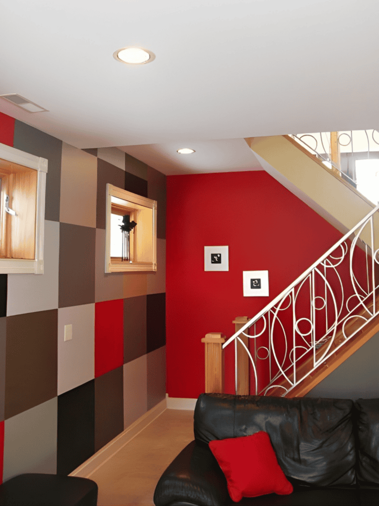 Vibrant interior decor featuring bold color blocks and stylish staircase design.
