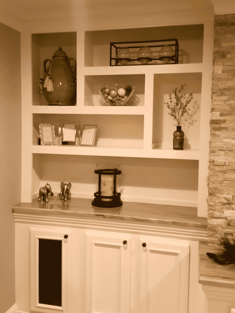 Decorative shelving units with stylish accents enhance home interior spaces.