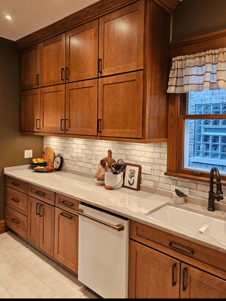 Clear image of custom wood kitchen cabinets with modern hardware and natural finish.